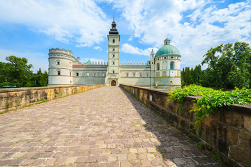 Entrance over a bridge to Krasiczyn castle in summer, Poland