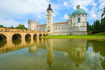 Reflection of Krasiczyn castle in a lake in summer, Poland