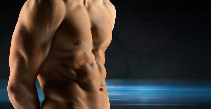 close up of male bodybuilder bare torso