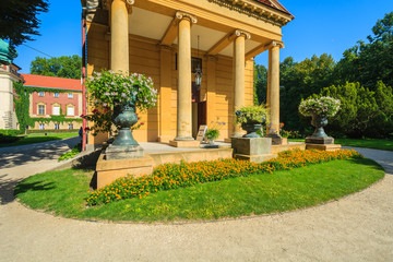 Obraz premium Historic building in gardens of Lancut castle in summer, Poland