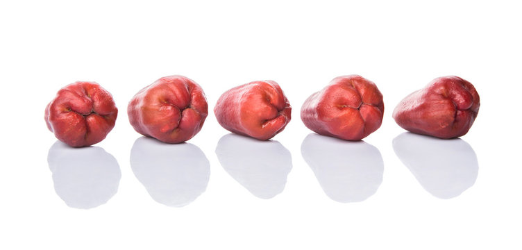 The exotic rose apple fruit over white background