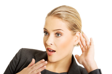 Woman overhearing a conversation