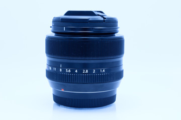 Black camera lens isolated on white background