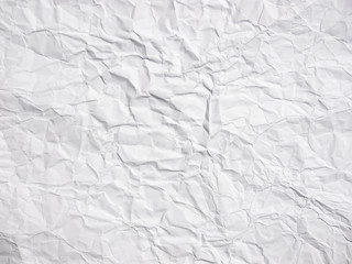 Wrinkled white paper texture background