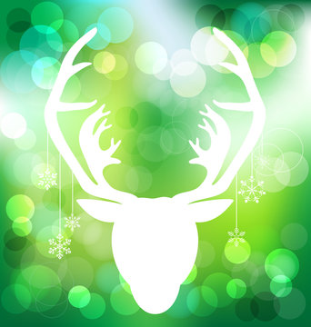 Christmas reindeer on bokeh background