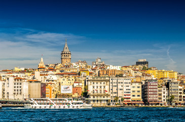 Obraz na płótnie Canvas Beautiful view of Beyoglu with Galata Tower on a sunny day - Ist