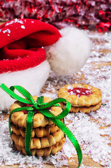 fragrant cookies on background of decorated Christmas ornaments