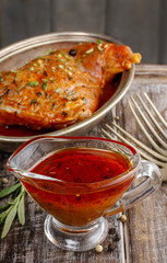 Honey and pepper red marinade in glass gravy boat