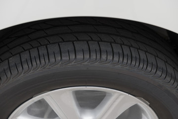 door and tyre of a white car