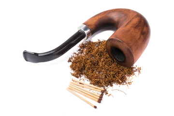 Wooden brown  pipe with dried tobacco leaves isolated