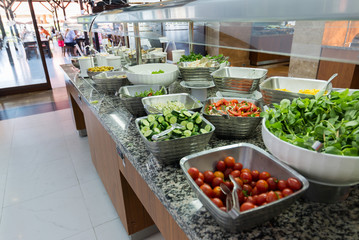 Buffet is a portioned salads on  table