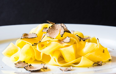 Plate of pasta.Tagliatelli with fresh truffle.