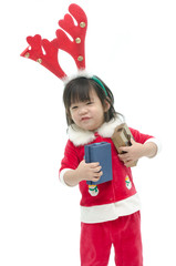 Cute asian baby wearing santa costume with present