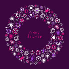 Christmas wreath made of snowflakes with Merry Christmas text