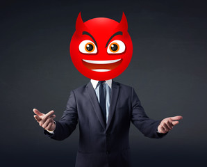 businessman wears devil smiley face