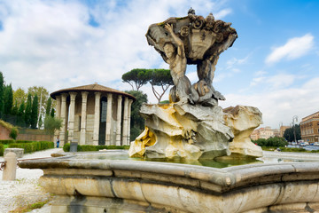 Rome, Italy: Fountain of Tritons and temple of Hercules.