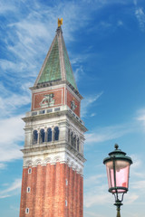Fototapeta na wymiar San Marco steeple under a cloudy sky