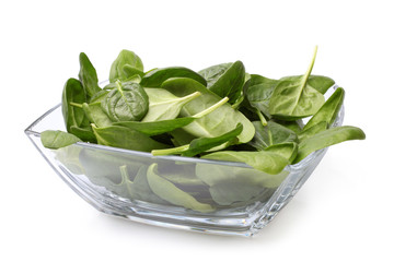 Glass bowl of fresh spinach