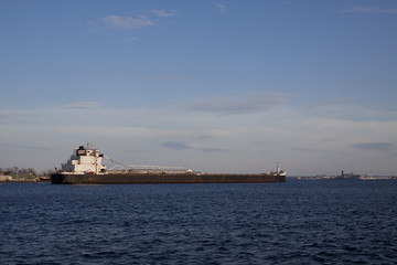 Fototapeta premium Ship Entering Harbor