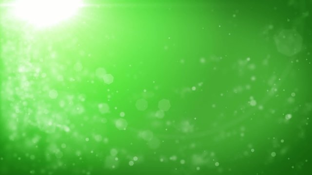 Abstract green Christmas background with bokeh defocused lights