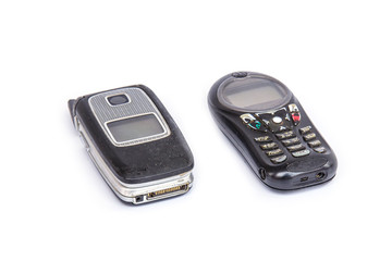 Old mobile phone isolated on white