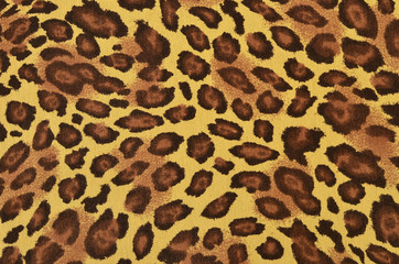Fototapeta na wymiar Brown leopard pattern.Spotted animal print as background.