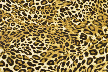 Brown and black leopard pattern.Spotted animal print background.