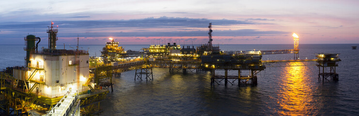 An offshore platform at sunset