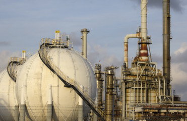 Oil-refinery plant with Liquefied Natural Gas (LNG) tanks