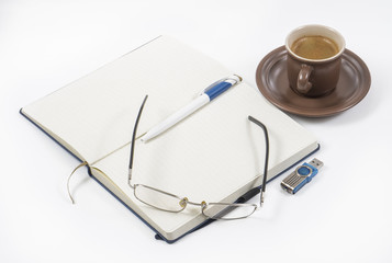 Notebook coffee and pen