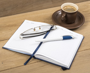 Notebook coffee and pen