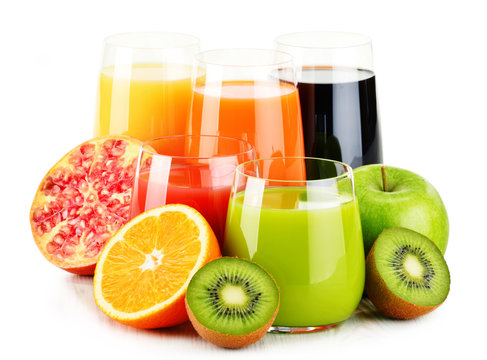 Glasses of assorted fruit juices isolated on white. Detox diet