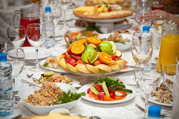 fruits and salads on the holiday table in the restaurant