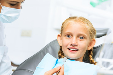 Fototapeta premium Dentist inspecting patient