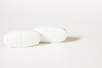 Two tablets on white