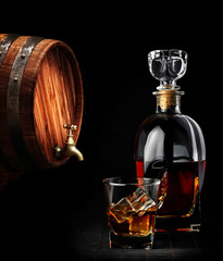 Cognac or brandy on a black background