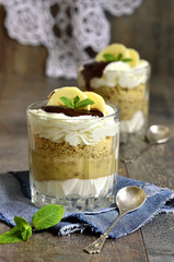 Dessert from banana,biscuits and whipped cream.