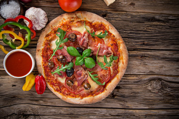 Delicious italian pizza served on wooden table