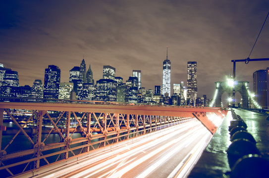 Fototapeta New York city night skyline from Brooklyn bridge