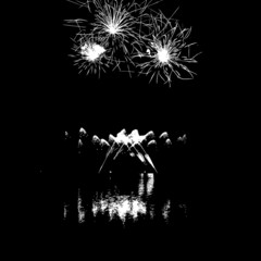 Fireworks with reflection on lake
