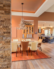 Dining Room with Entryway and View of Kitchen