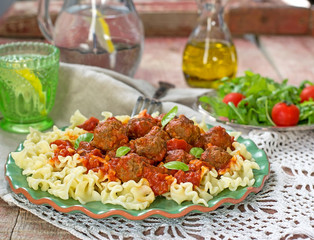 Pasta with mini meatballs with tomato sauce