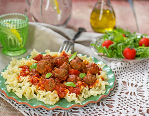 Pasta with mini meatballs with tomato sauce