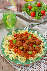 Pasta with mini meatballs with tomato sauce