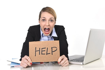 young stressed businesswoman holding help sign overworked