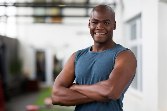 African American Man With Arms Crossed In Gym