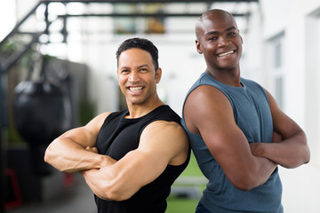 Obraz na płótnie Canvas gym trainers with arms crossed