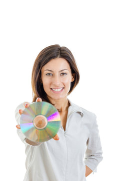 Beautiful caucasian casual smiling woman holding up compact disc