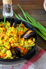 Traditional paella with mussels