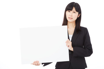 Naklejka premium メッセージボードを持って困るビジネスウーマン